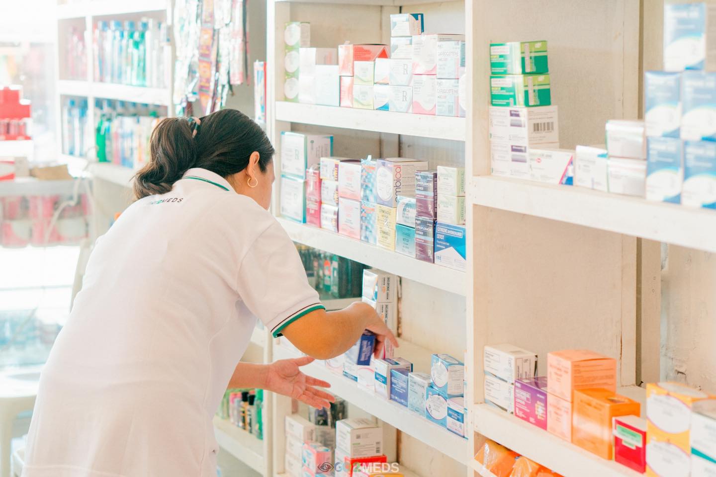 Modern pharmacy interior showcasing clean and organized shelves