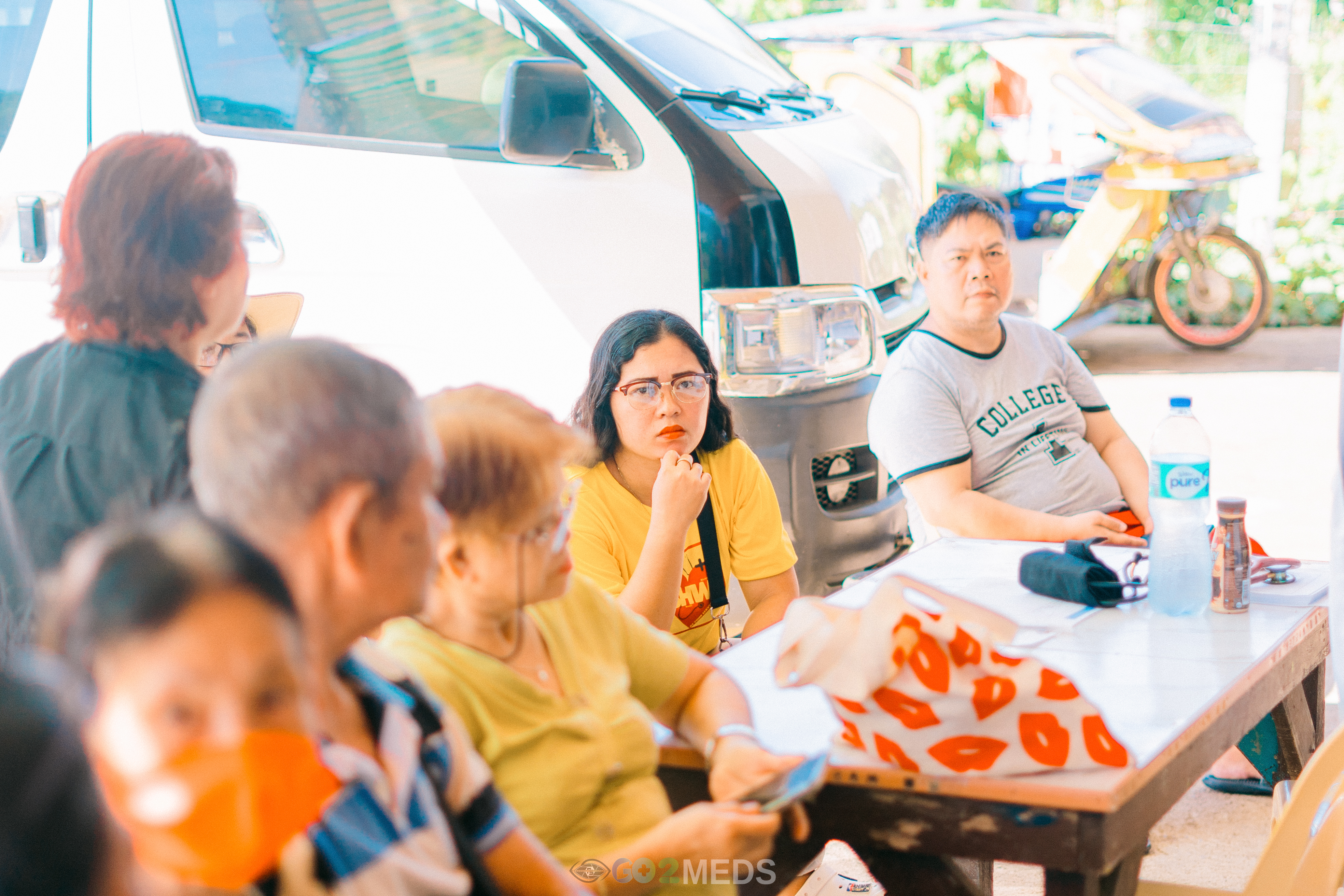 Medical mission team distributing medicines to community