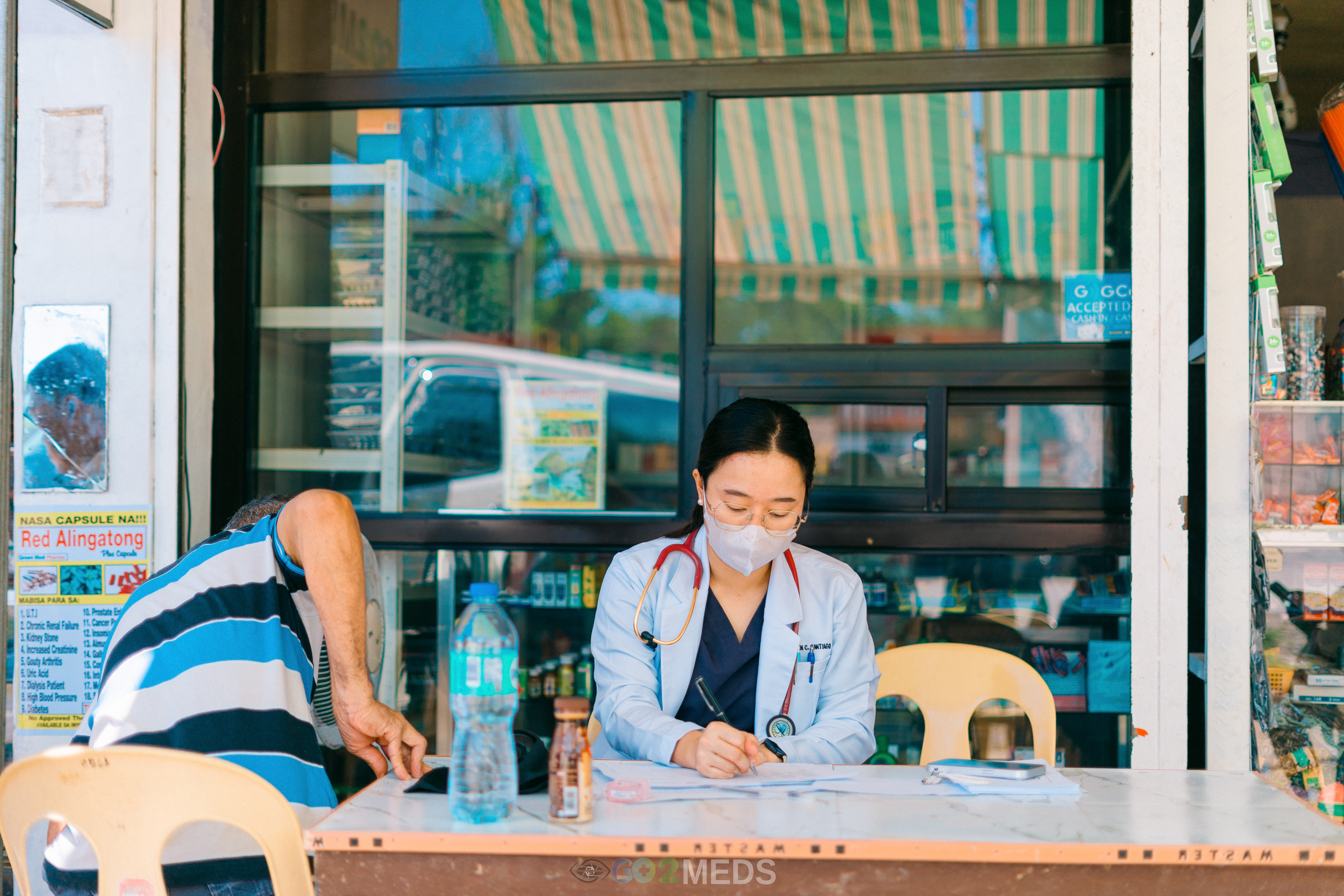 Group photo of medical mission team and beneficiaries