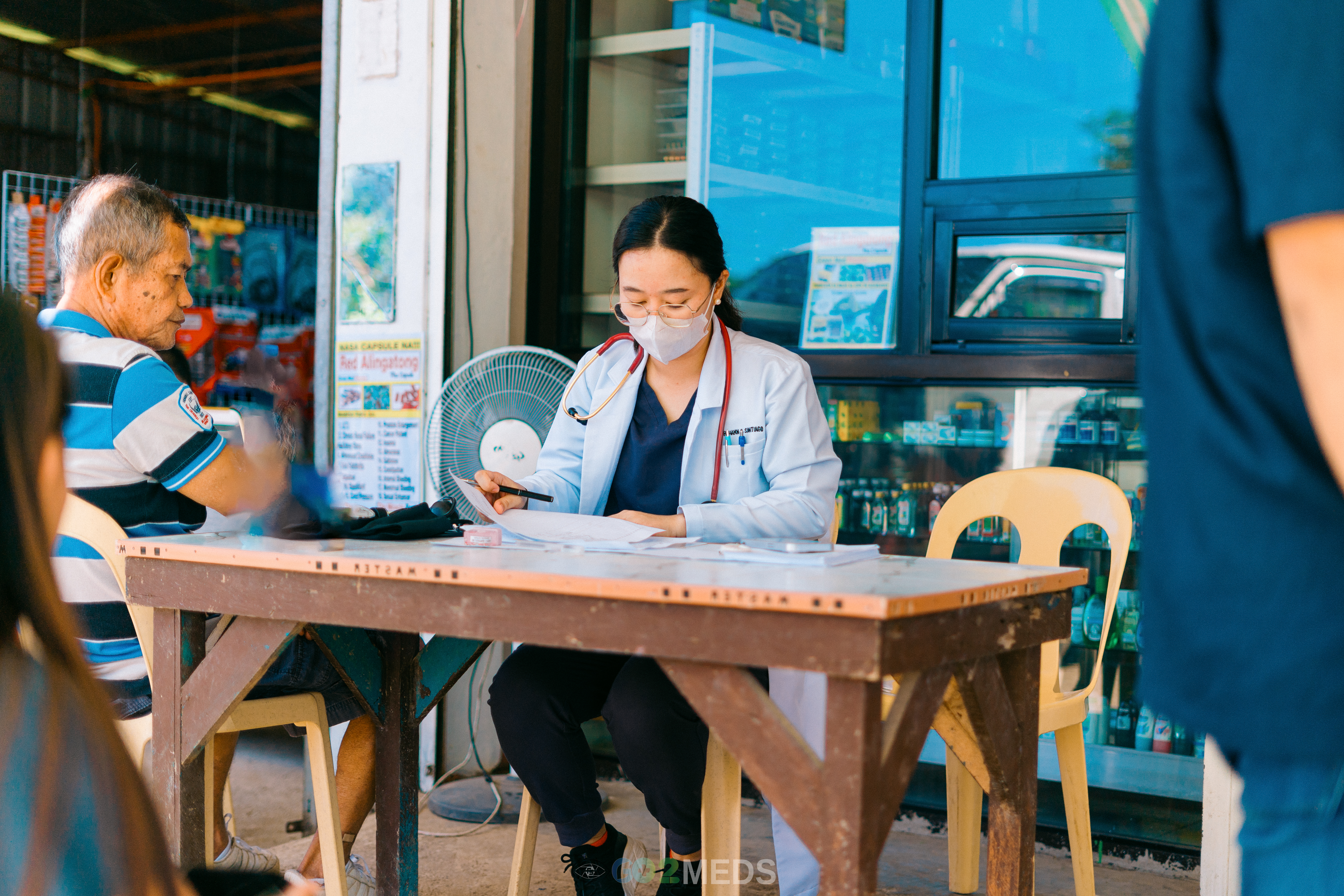 Group photo of medical mission team and beneficiaries