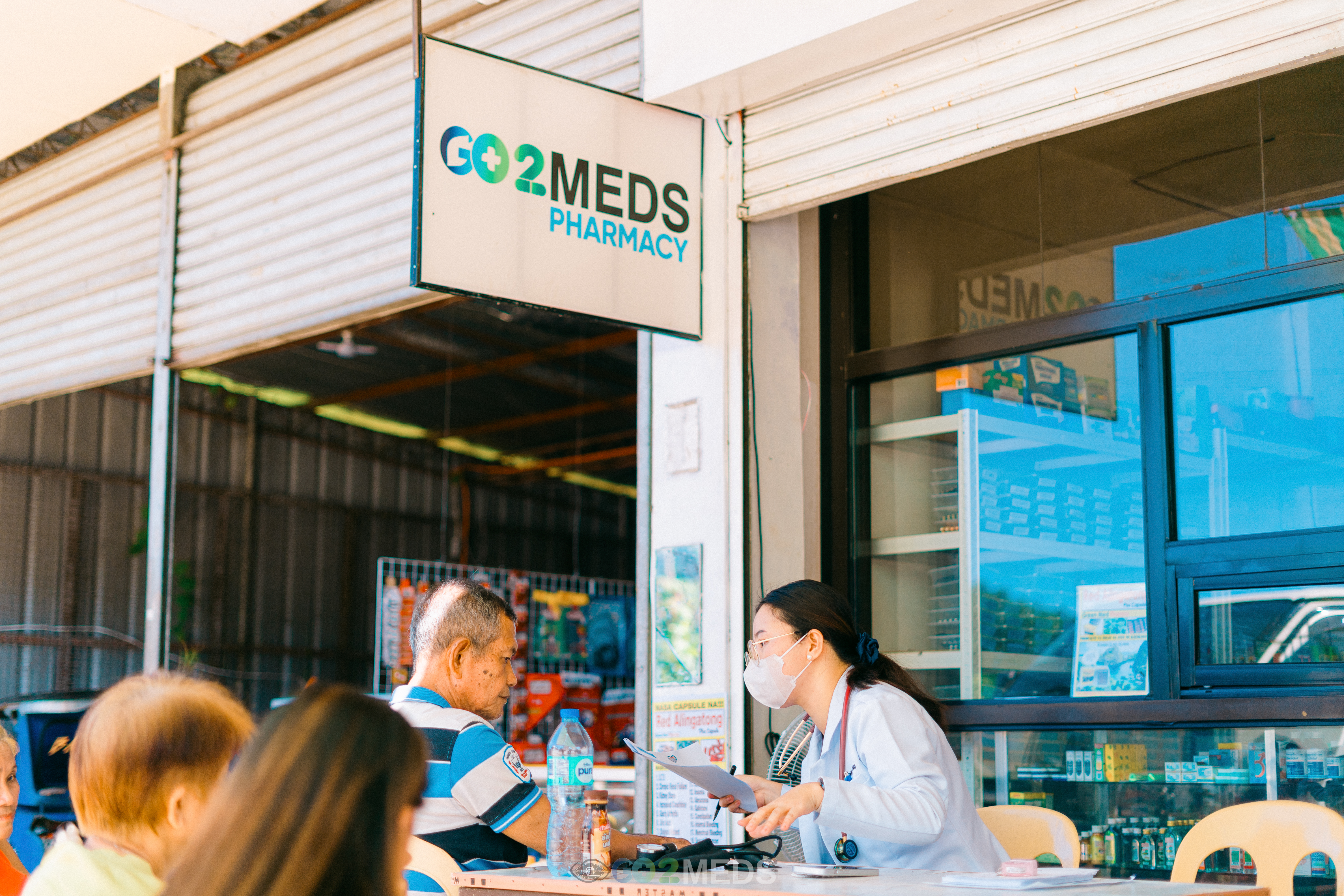 Group photo of medical mission team and beneficiaries