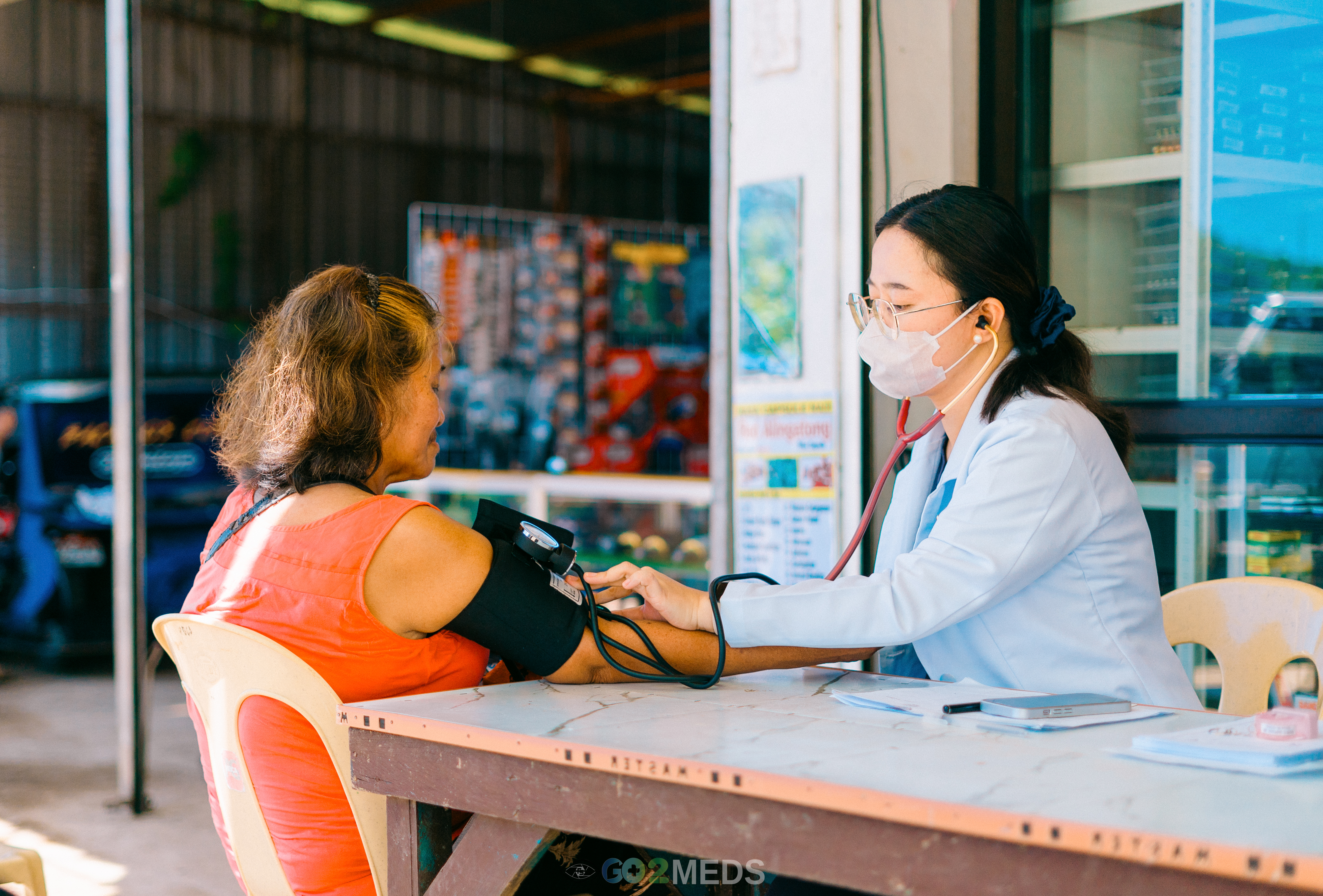 Group photo of medical mission team and beneficiaries