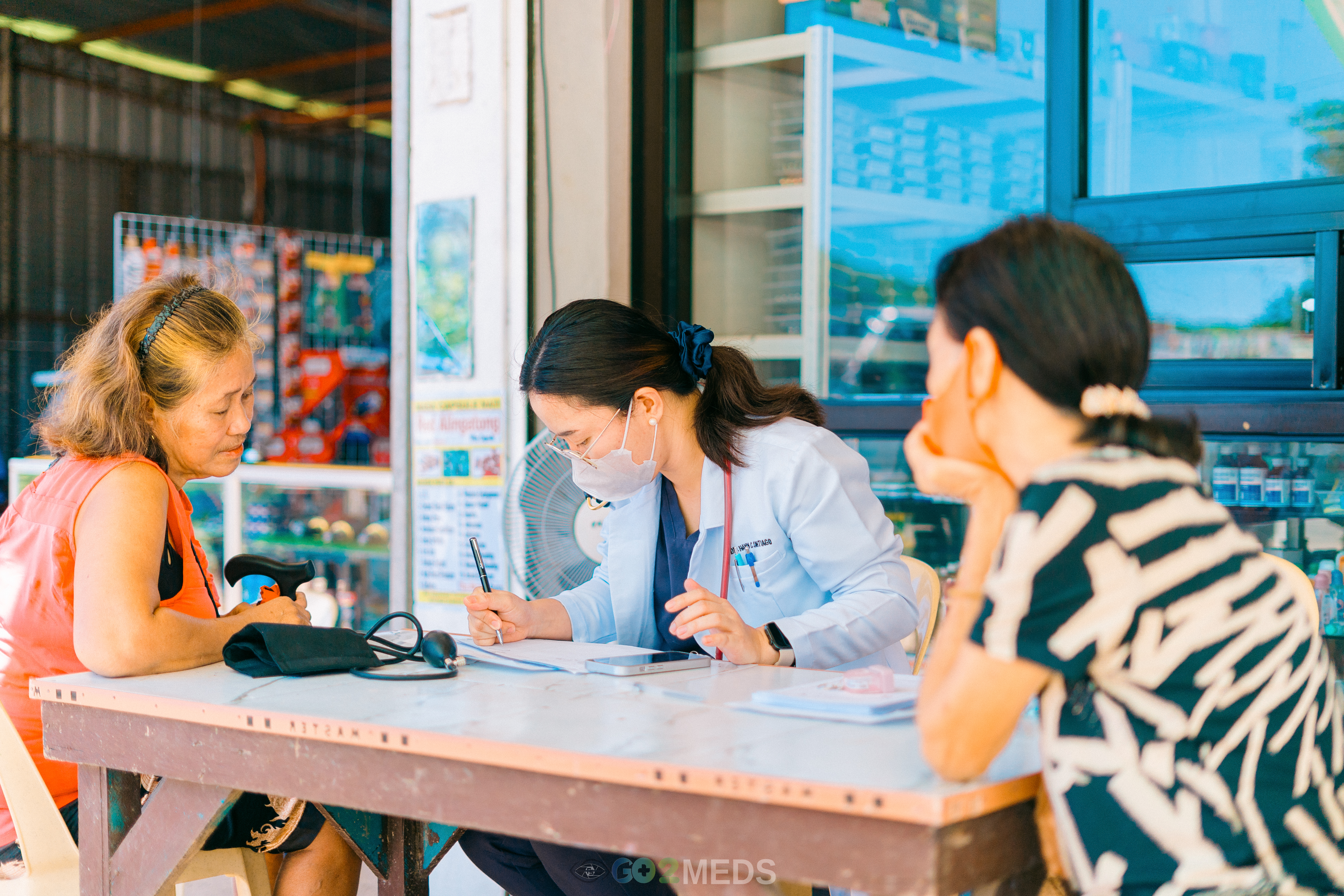 Group photo of medical mission team and beneficiaries