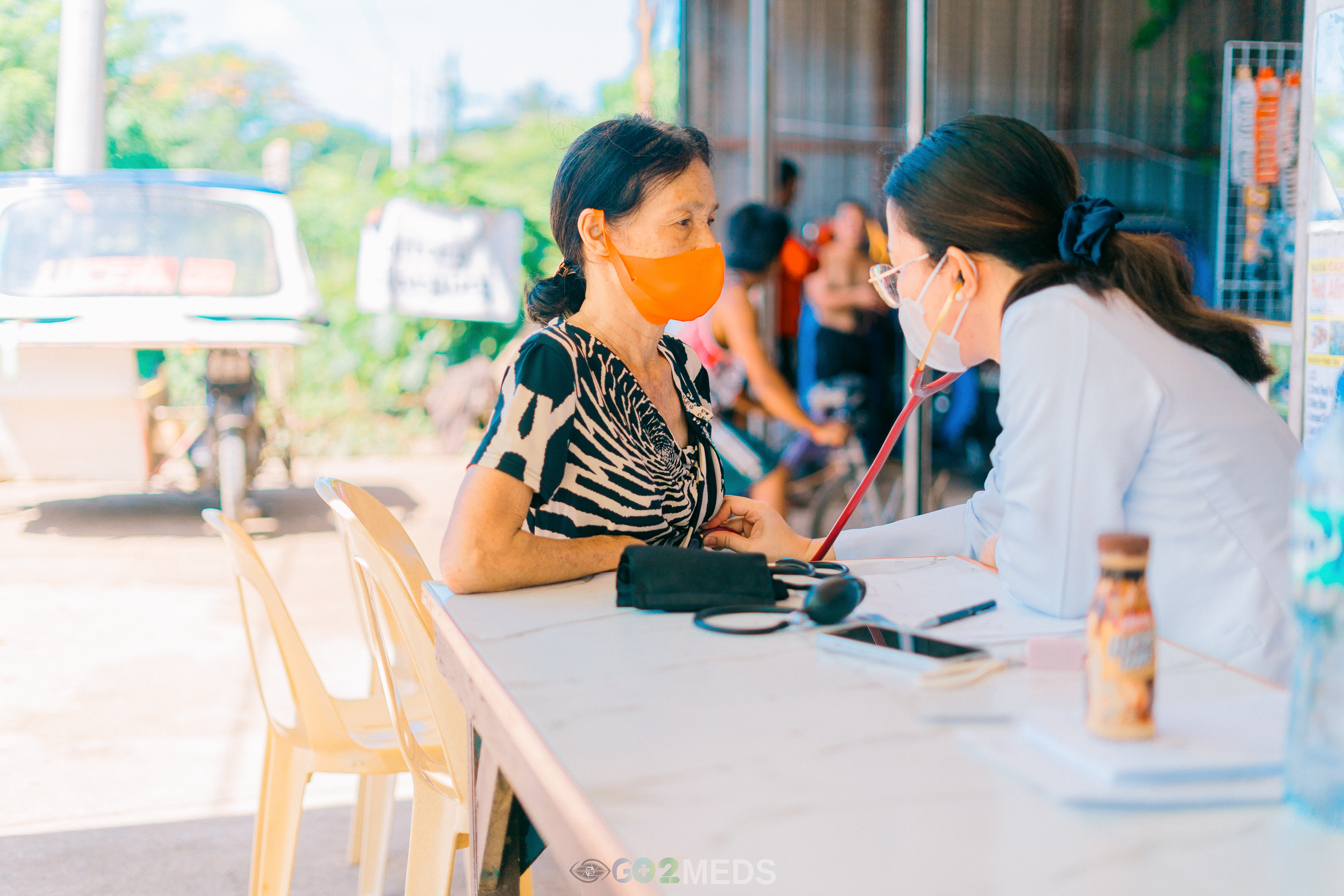Group photo of medical mission team and beneficiaries