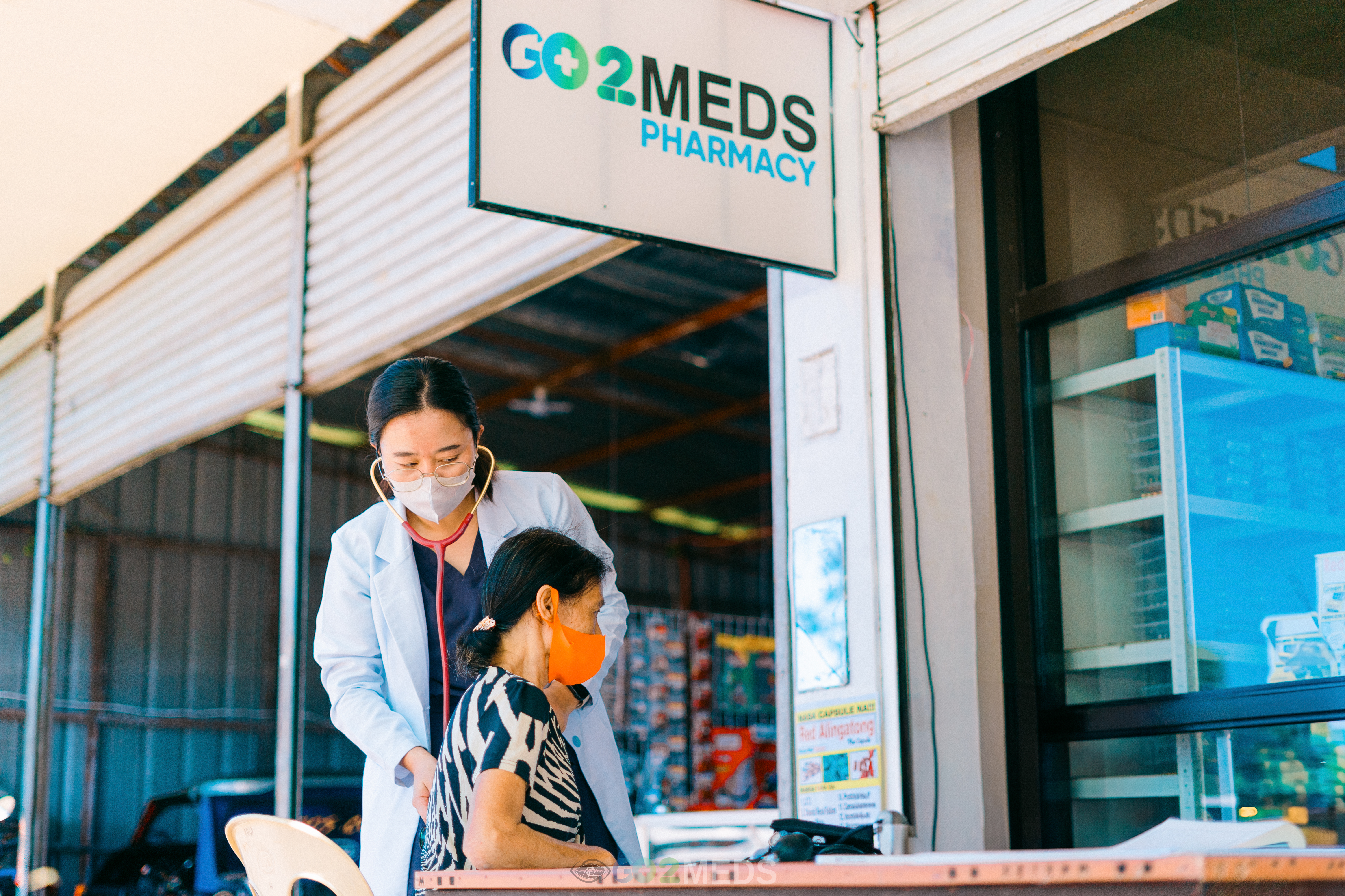 Group photo of medical mission team and beneficiaries