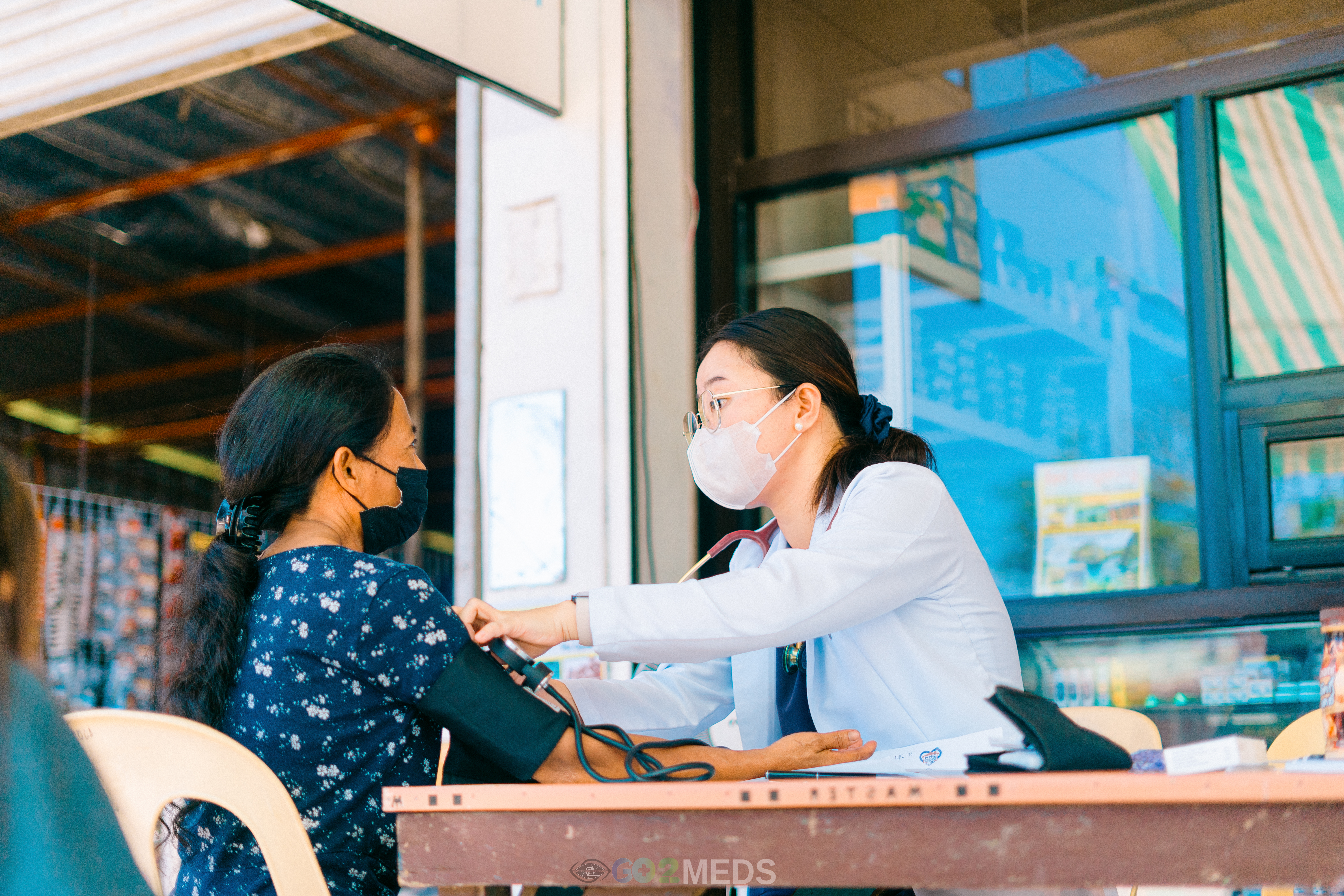 Group photo of medical mission team and beneficiaries