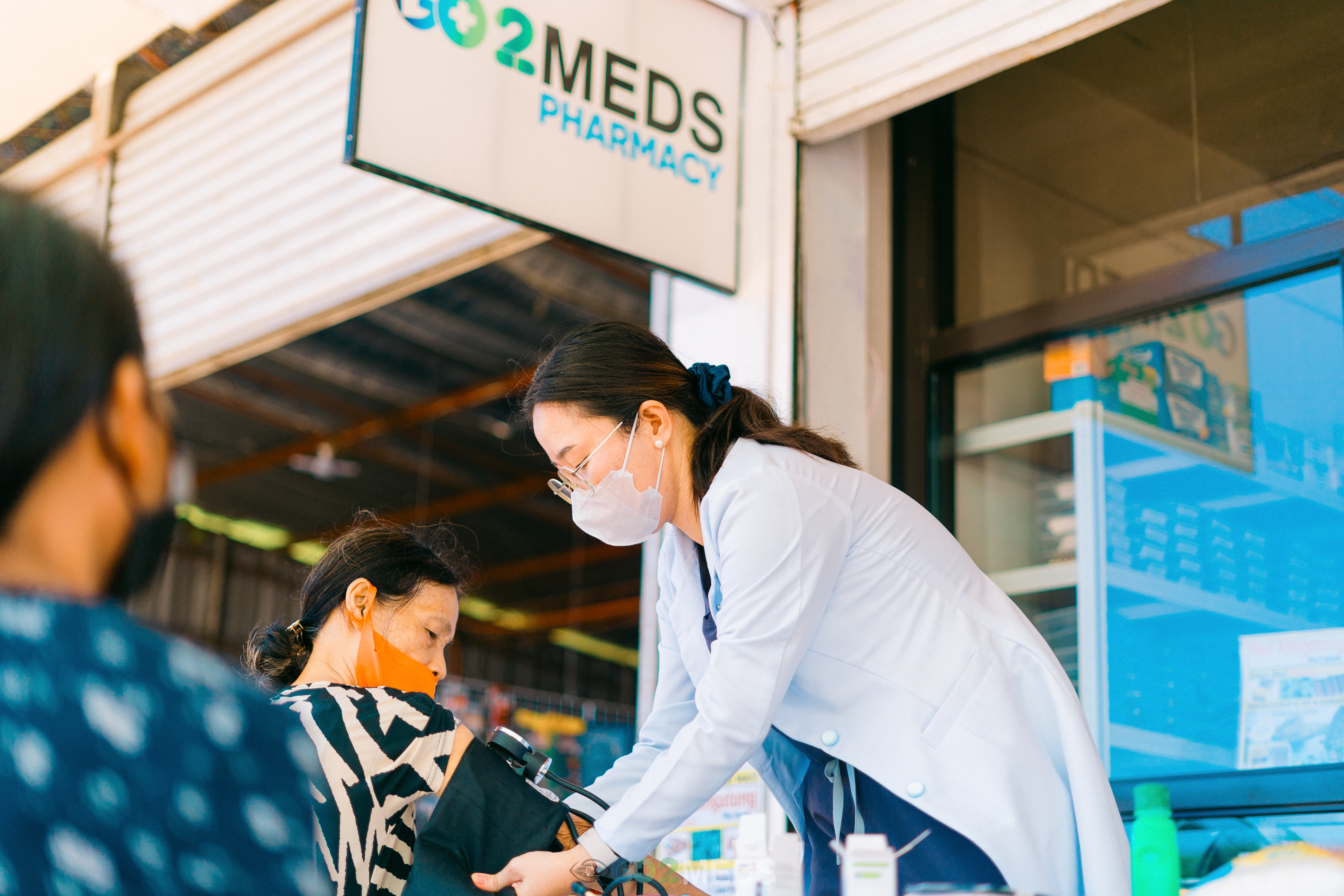 Group photo of medical mission team and beneficiaries