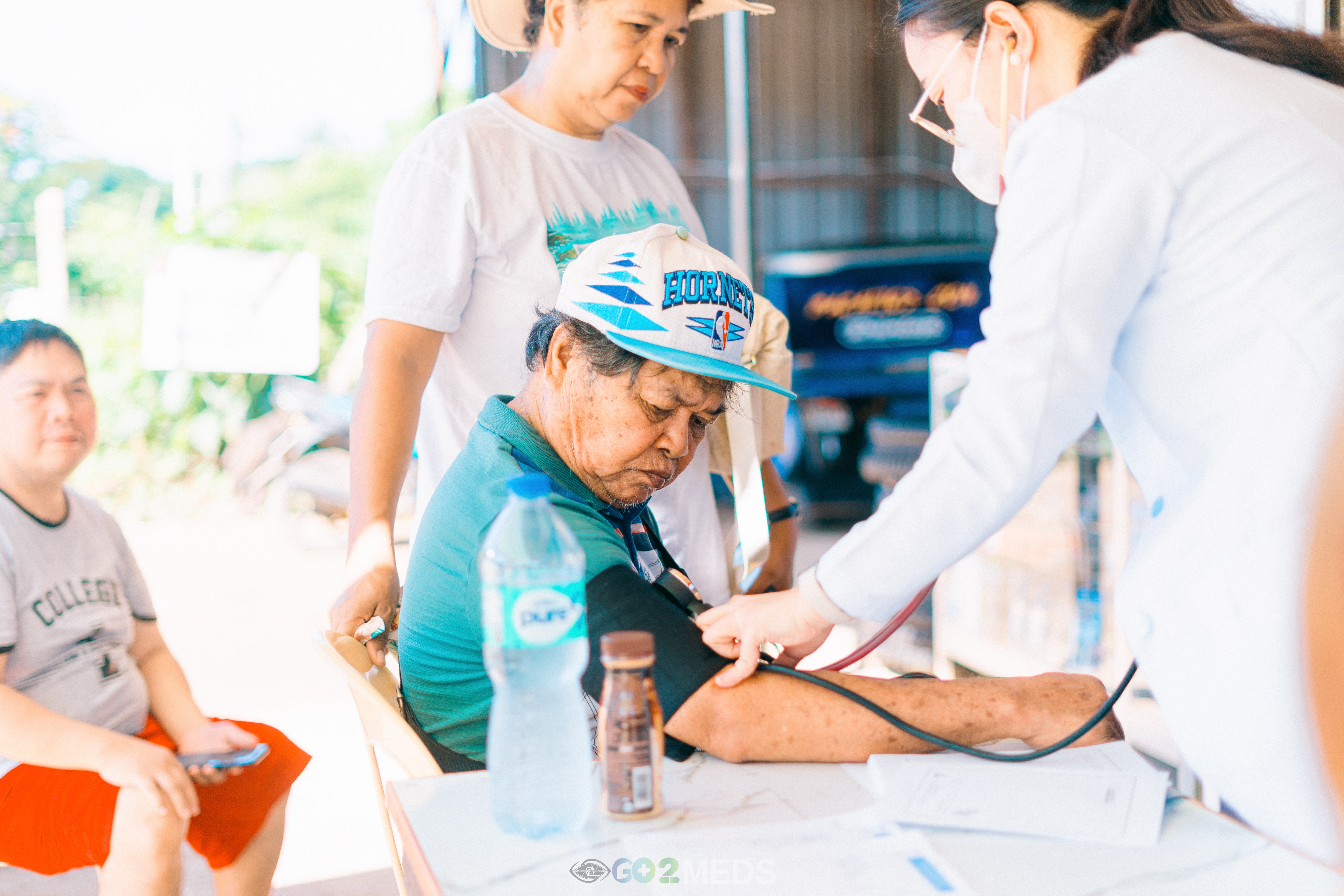 Group photo of medical mission team and beneficiaries