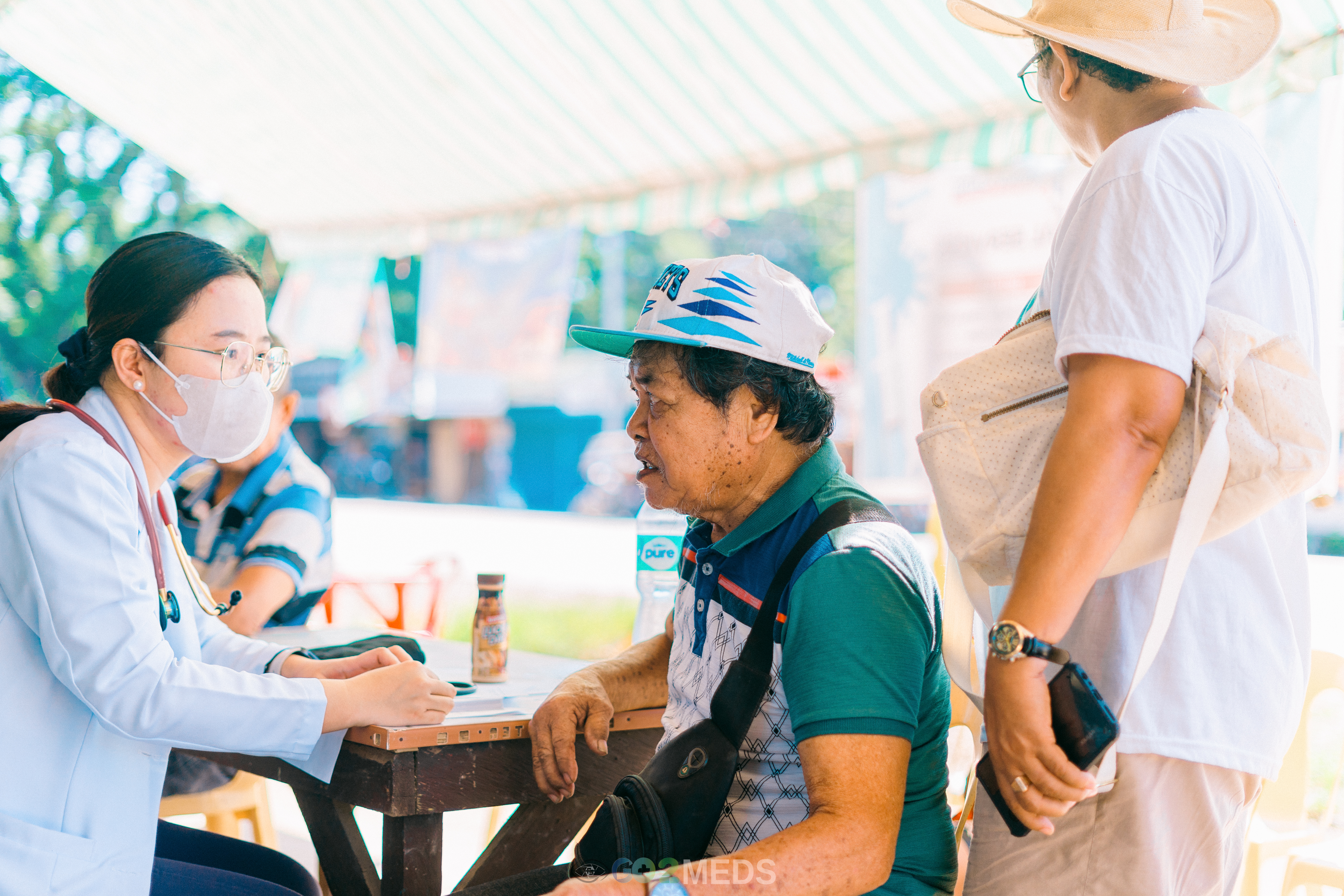 Group photo of medical mission team and beneficiaries