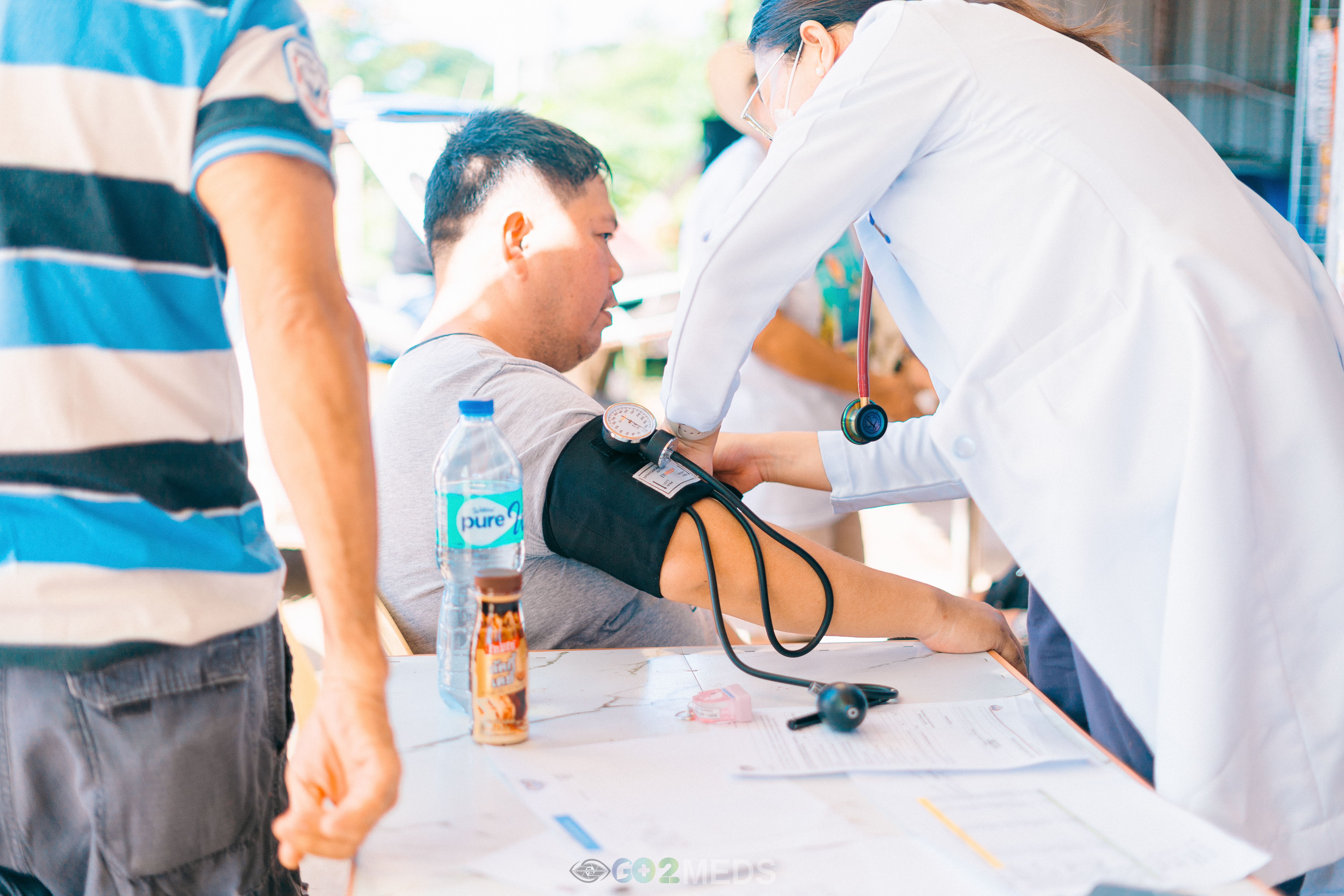 Group photo of medical mission team and beneficiaries