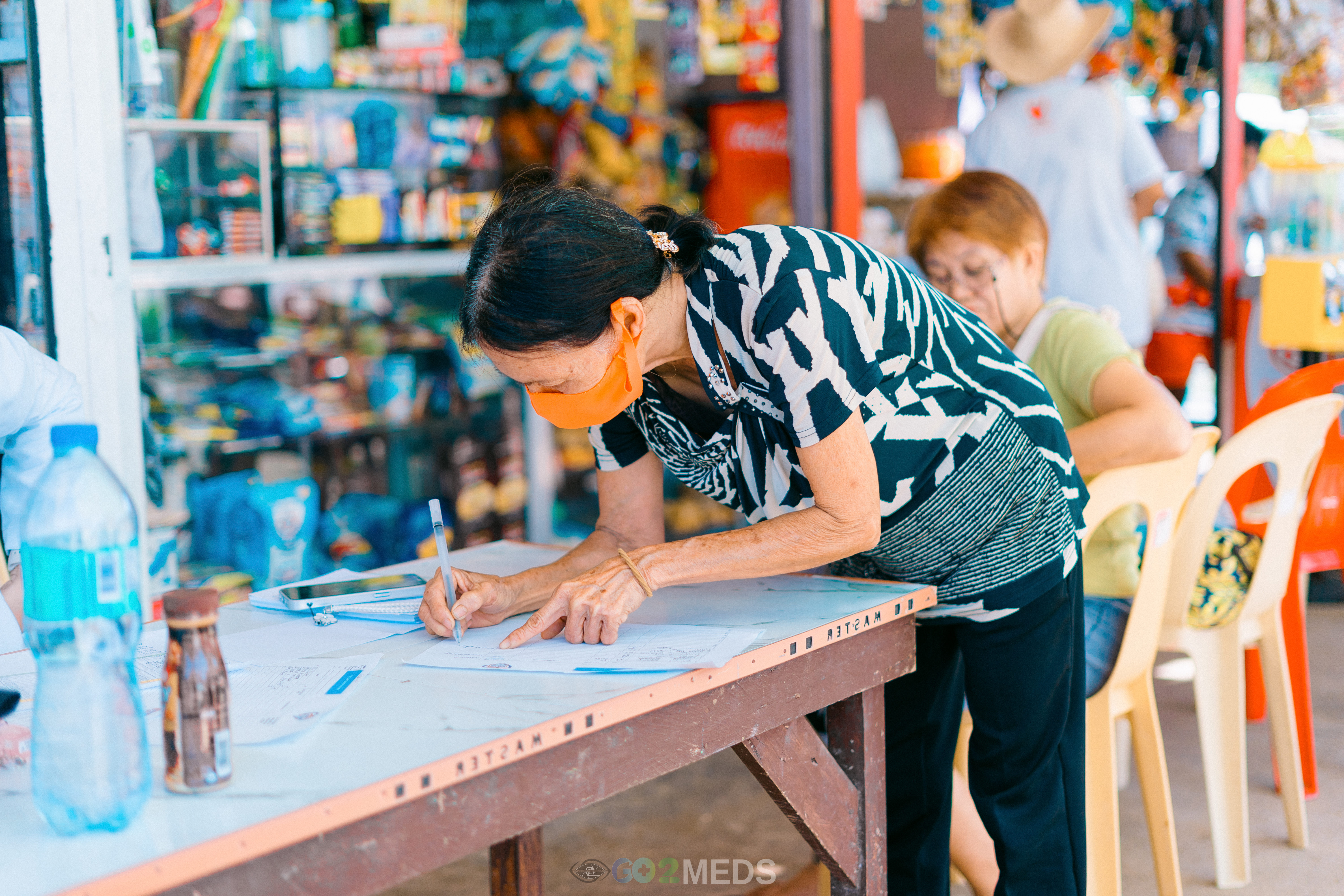 Group photo of medical mission team and beneficiaries